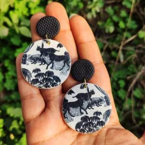 Black and white cheetah print handmade earrings in Pakistan is a secret to an enchanting look. Radiate your charm with these round unique pieces of art by SEA.