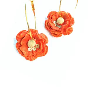 Orange flower hoops is a chunk floral design. SEA's handmade earrings in Pakistan are beautiful, blood-flushing and trendsetter. The color is so pleasing to eyes, that you'll become head-turner of the show.